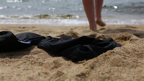 taking off bikinis|Woman Taking Off Bathing Suit photos .